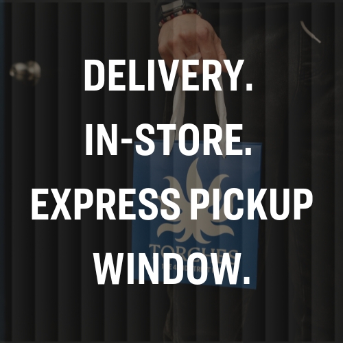 Person holding a blue shopping bag with the text: Delivery. In-store. Express Pickup Window.