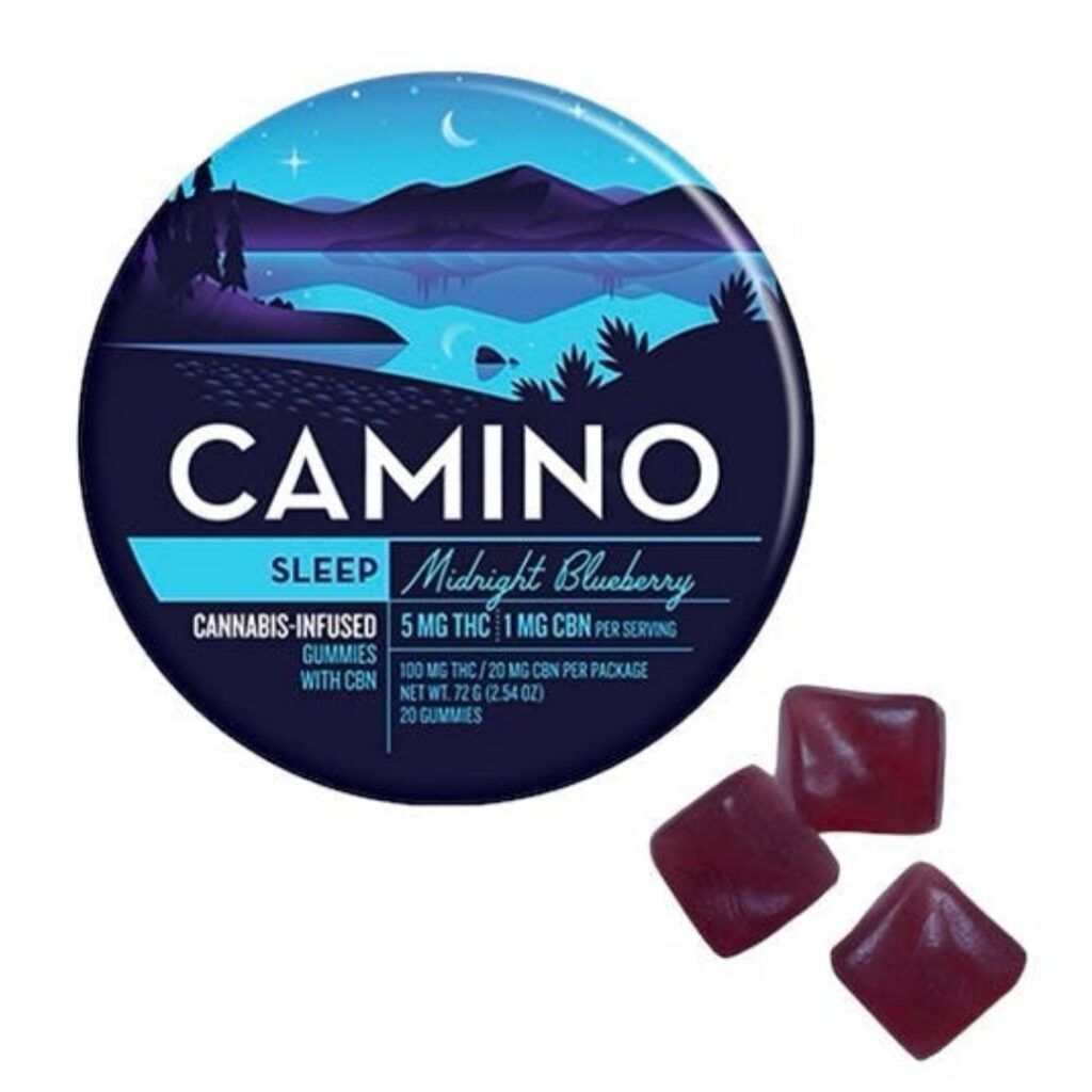 Round tin labeled Camino Sleep Midnight Blueberry, featuring Camino gummies with three dark gummies beside it.