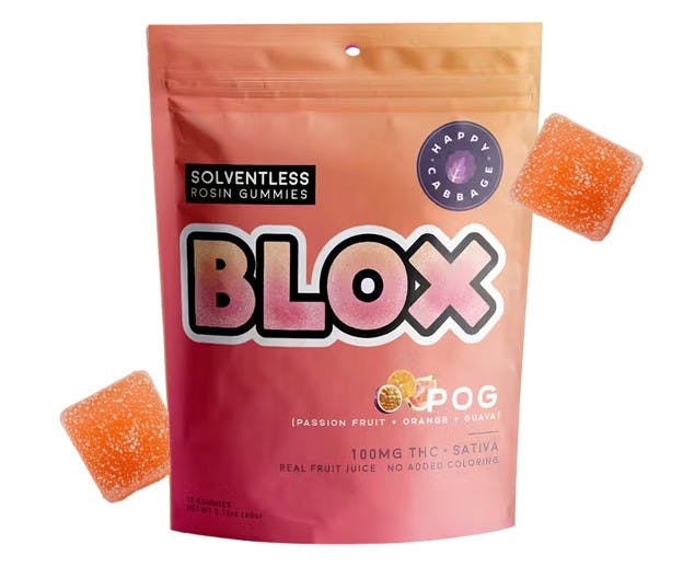 Pink Blox gummies bag with two orange sugar-coated gummies beside it, labeled passion fruit, orange, and guava.