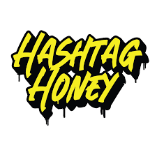 Yellow graffiti-style text HASHTAG HONEY with a black shadow and dripping paint effect on a white background.