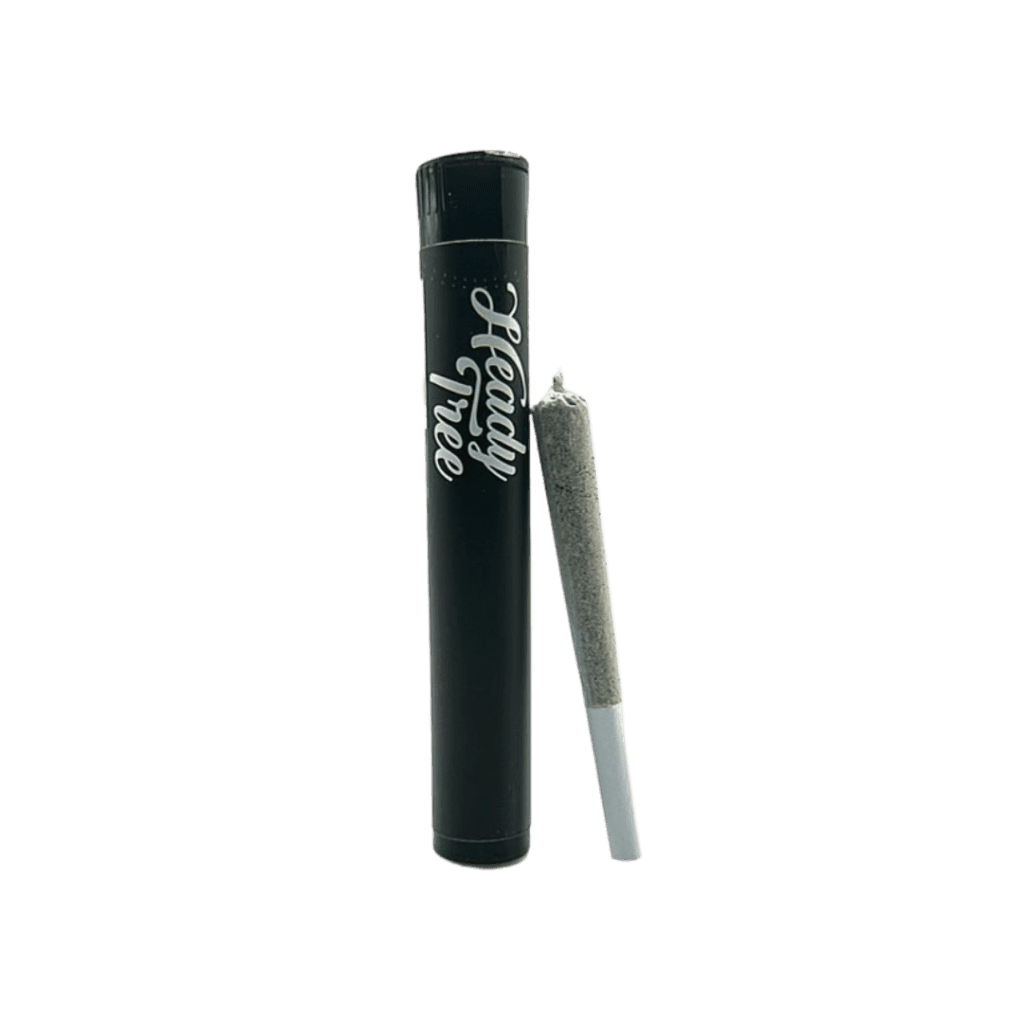 A pre-rolled joint next to a black tube labeled Heady Tree on a plain background.