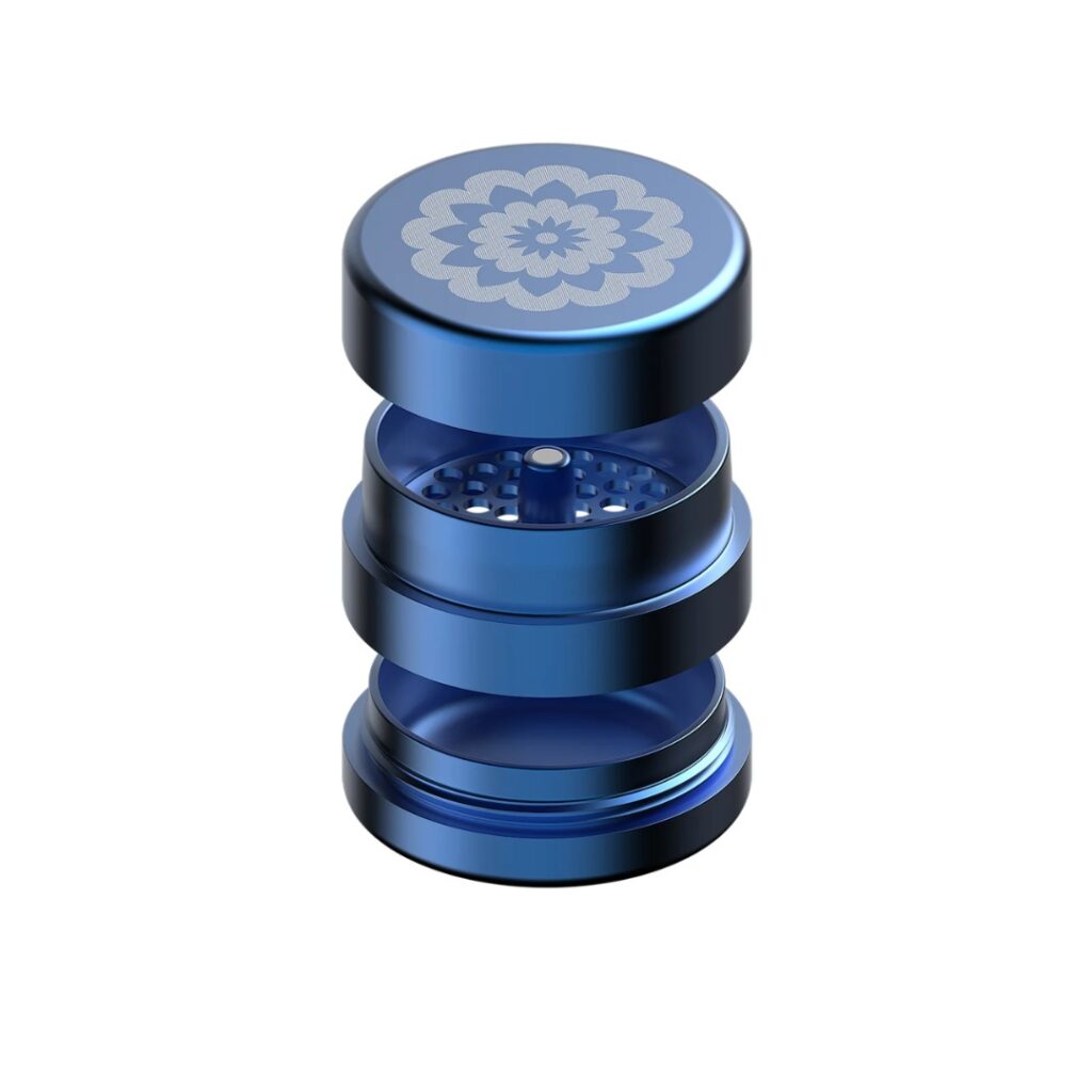 A blue metal Flower Mill Grinder with a flower pattern on top, shown open to display its compartments.