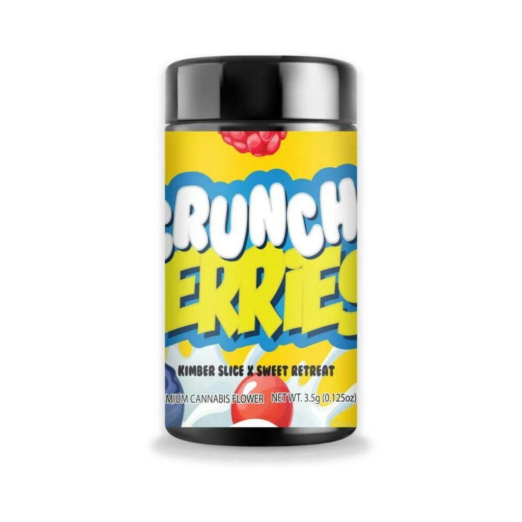 A colorful jar labeled Crunch Berries strain features cartoon berries and bold, playful lettering on the front.