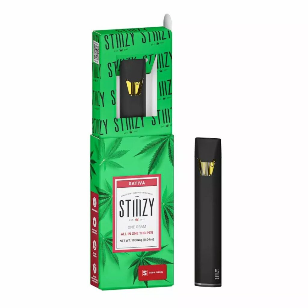 A STIIIZY sativa vape pen and its green, cannabis-themed packaging with red and white labeling—perfect for a wake and bake session.