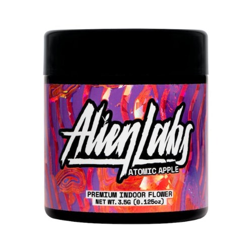 A jar labeled Alien Labs Atomic Apple sits against a colorful, wavy red and purple background, showcasing the vibrant style of the Alien Labs Brand.