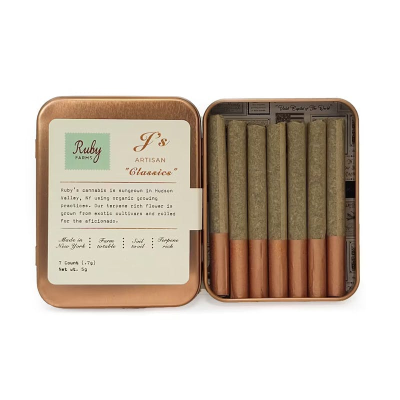 A tin box containing seven rolled cannabis joints with brown tips, labeled Ruby Farms Js Artisan Clasicos.