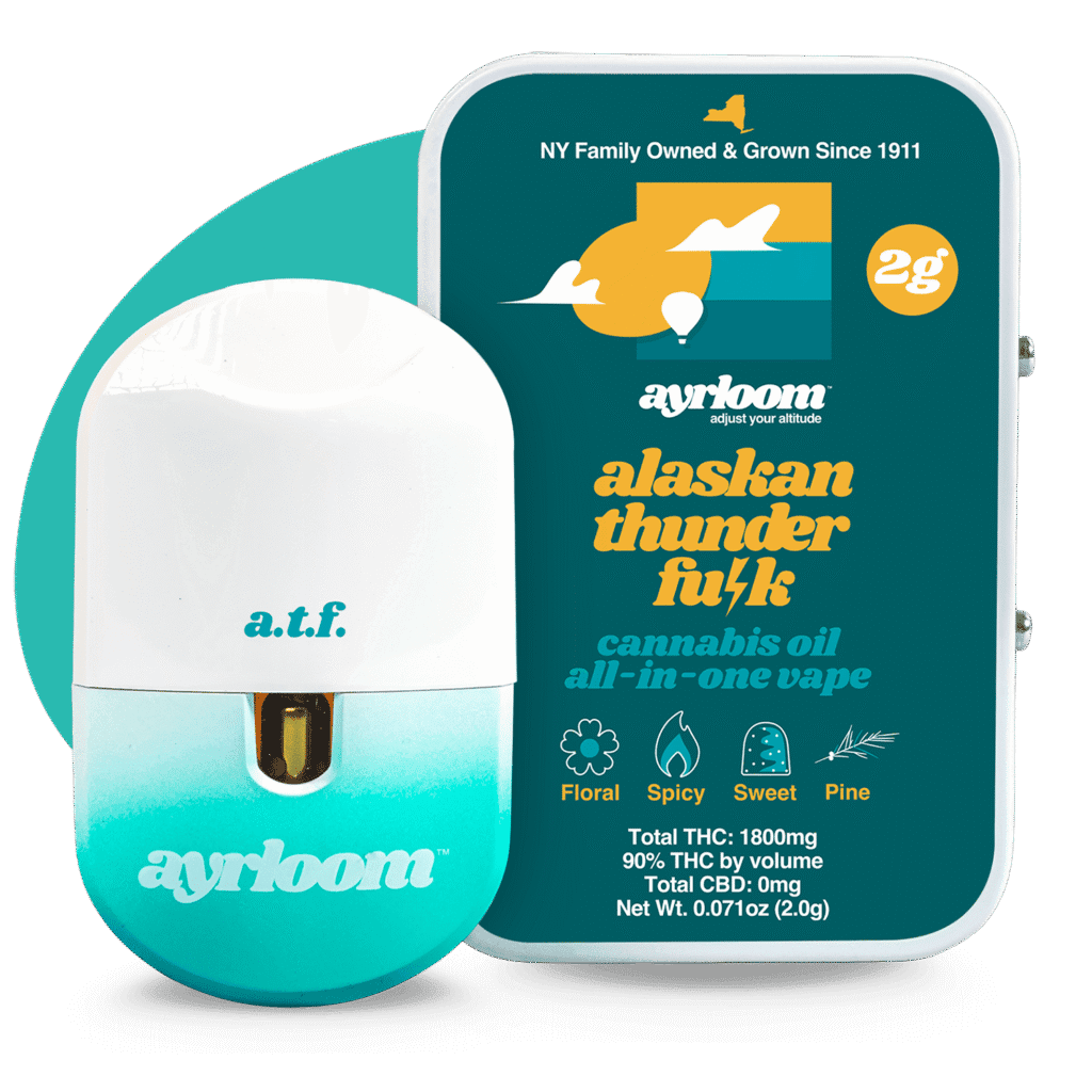 A turquoise vape pen and tin labeled “alaskan thunder fuck” cannabis oil, with icons for flavor notes.