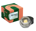Green and peach product box with a small clear jar of yellow cream and a black lid beside it, evoking the vibrant energy of Torches NYC.