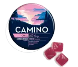 Round Camino Chill Wild Berry tin with three pink gummies beside it, label shows a scenic sunset illustration reminiscent of the vibrant evenings at Torches NYC.