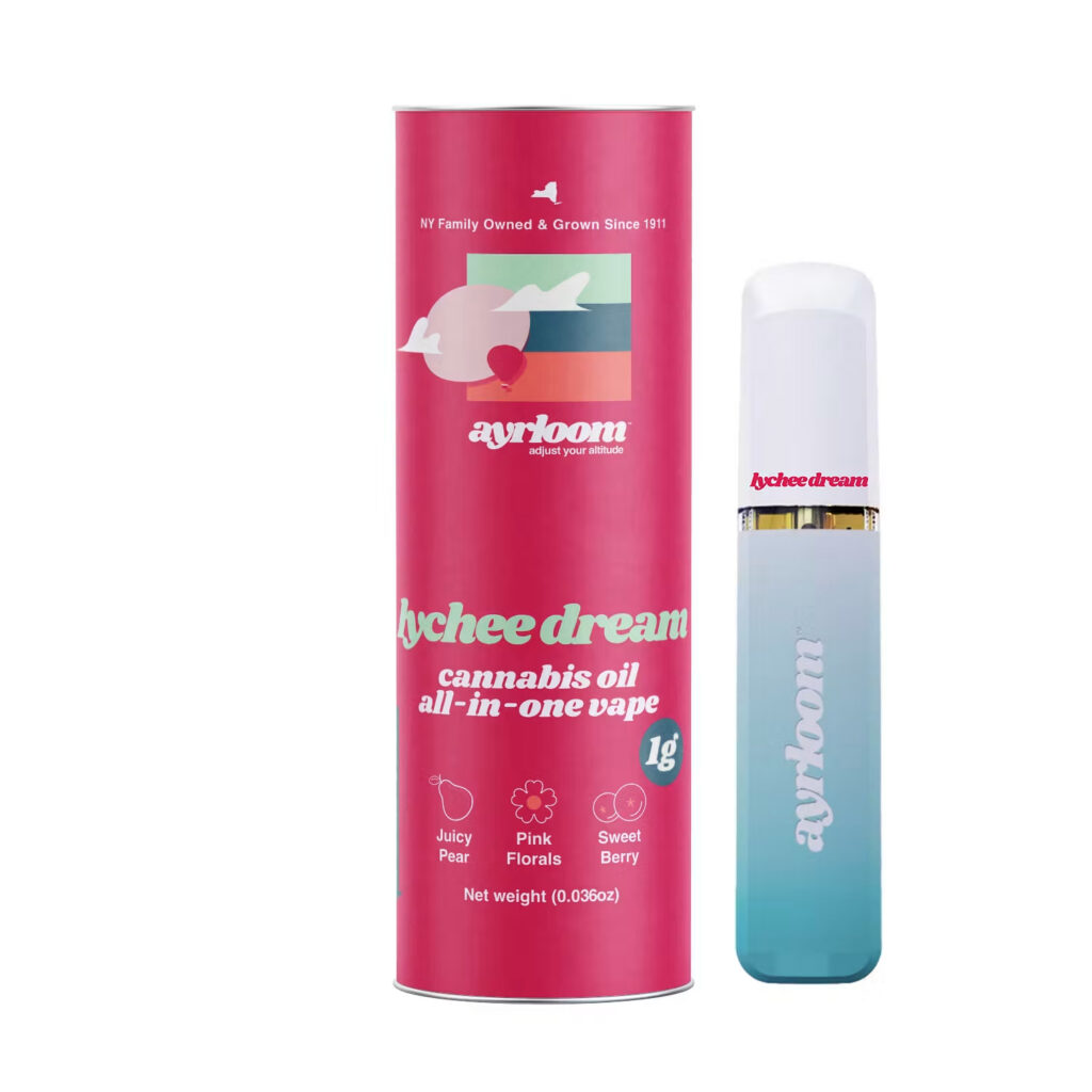 Pink cylindrical lychee dream vape packaging and a blue-to-white gradient vape pen standing beside it.