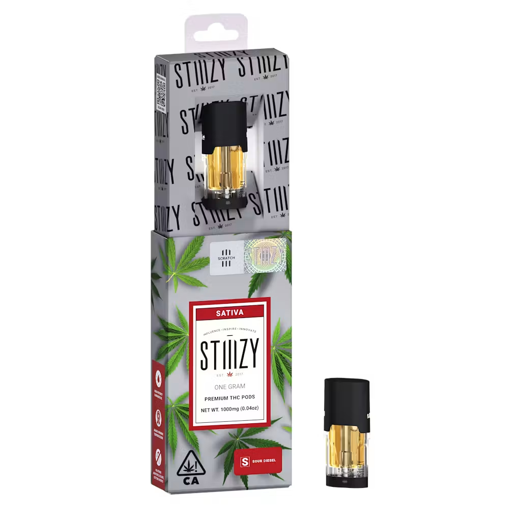 STIIIZY Sativa cannabis vape cartridge and packaging with green leaves and red label on white background.